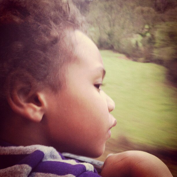 Noah with his head out the window on the SVR